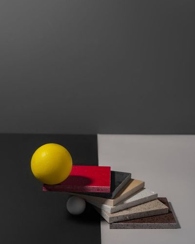 Minimalist composition of balanced heavy elements